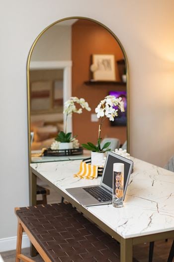 A laptop computer sitting on a table